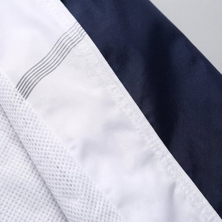 Two-piece comfort fit tracksuit for men, perfect spring/autumn athletic and loungewear.