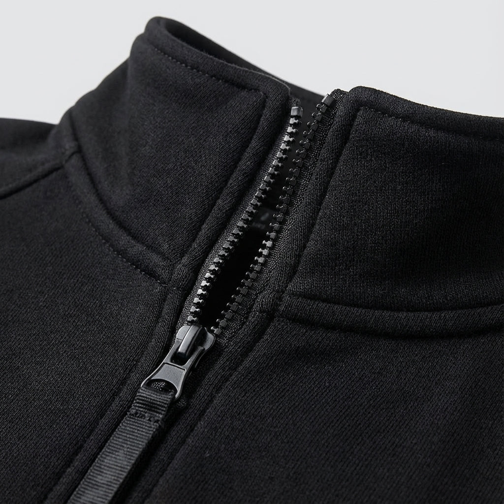 Sporty men's padded vest in black, featuring a comfortable fleece lining, perfect for outdoor activities.