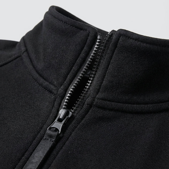 Sporty men's padded vest in black, featuring a comfortable fleece lining, perfect for outdoor activities.