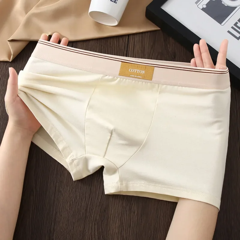 High-performance men's underwear, a 3-pack of mid-rise boxer briefs for athletic comfort.