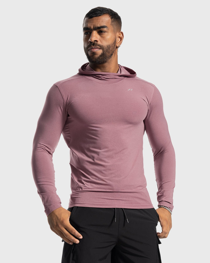 Flexible men's baselayer hoodie, moisture-wicking and stretch fit, ideal for intense training.