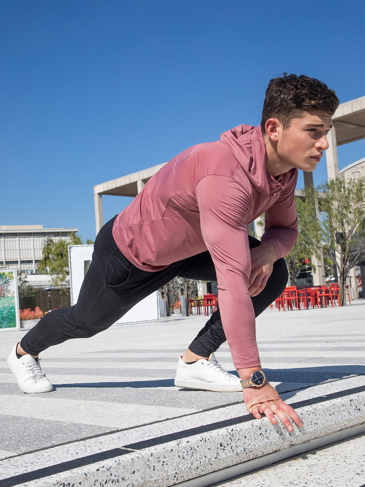 Stealth men's baselayer hoodie, designed for active comfort and superior moisture-wicking.