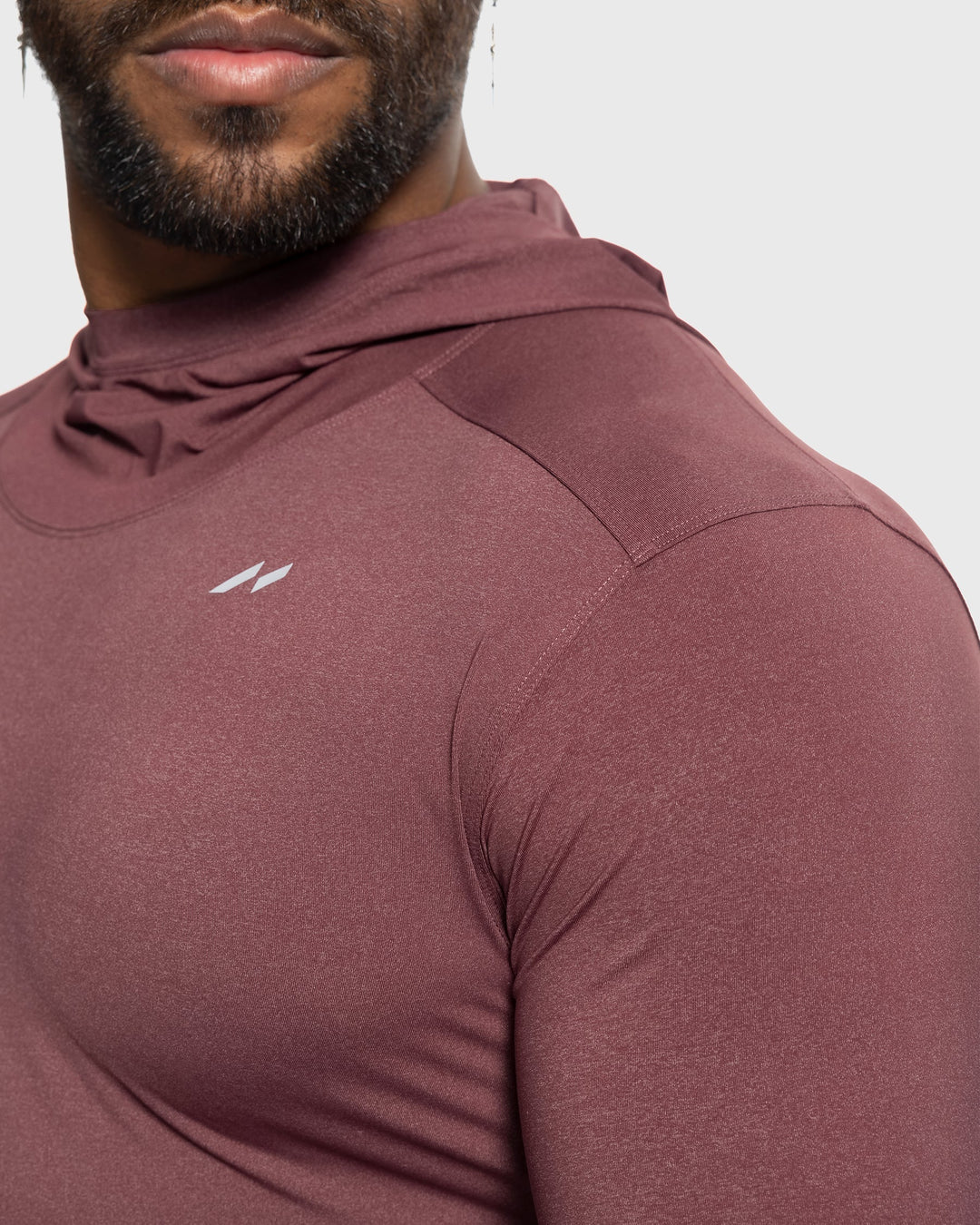 Men's sports training baselayer hoodie, a performance top with stretch fit & athletic support.