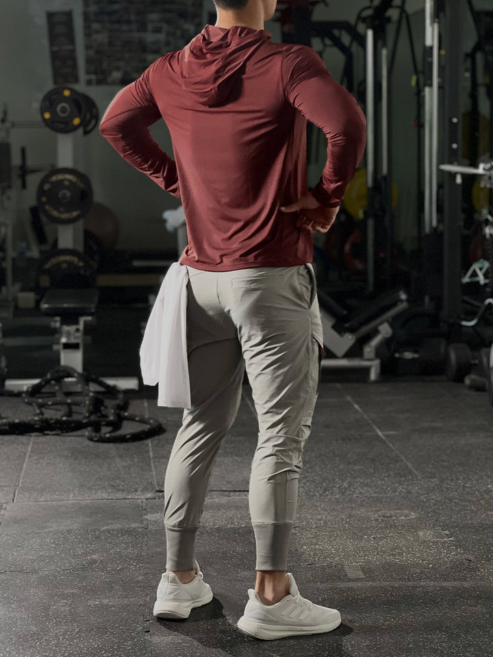 Men's active comfort baselayer hoodie, a stealth performance top for any workout or run.