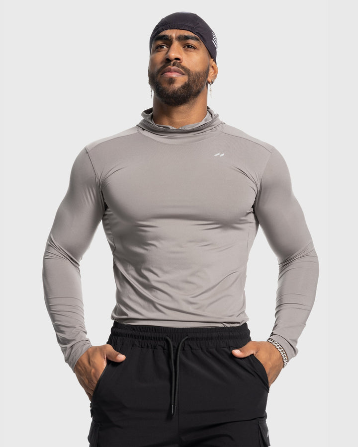 Stealth men's baselayer hoodie, a moisture-wicking top for gym wear and active performance.