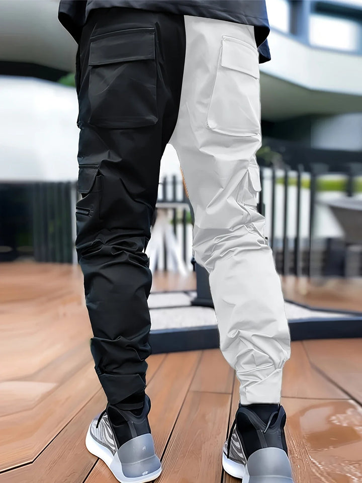 Back view of men's reflective cargo jogger pants, highlighting the sleek design and pocket placement.