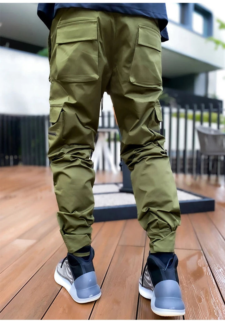 Versatile men's reflective cargo joggers, blending athletic function with trendy street style.