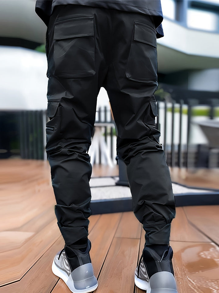 Stylish men's reflective cargo joggers featuring deep pockets and a comfortable, lightweight design.