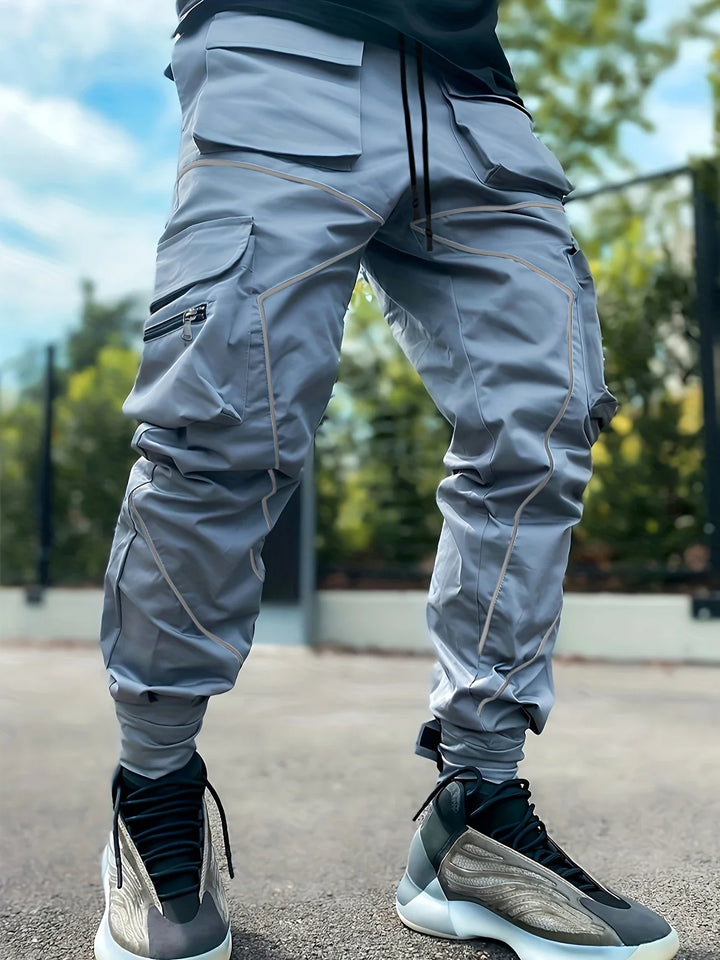 Men's activewear Stealth reflective cargo pants, ideal for jogging or street style outfits.