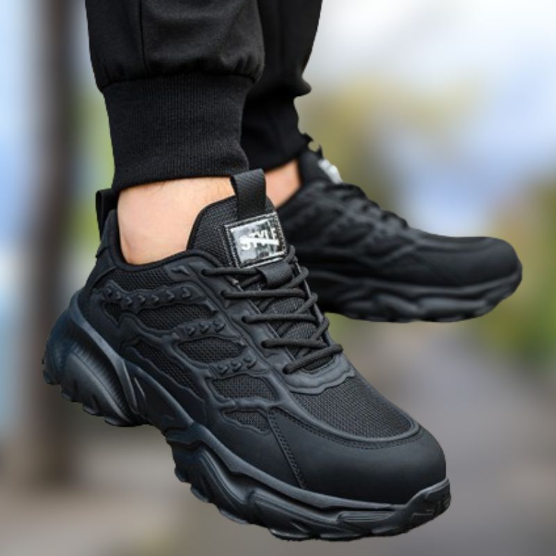 Comfortable men's work shoes, steel toe safety sneakers for industrial and construction use.