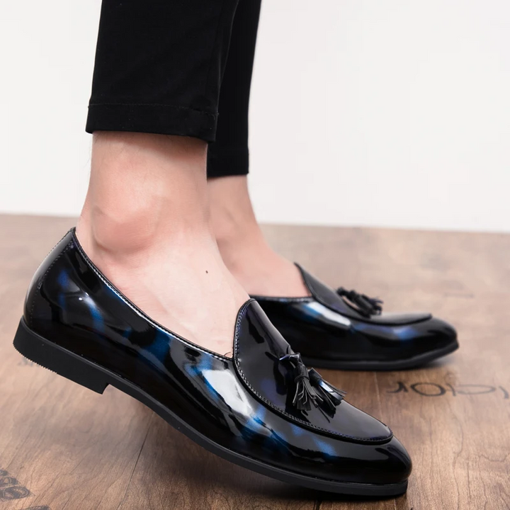 Premium men's dress shoes: Sterling Midnight blue loafers with a sophisticated almond toe.