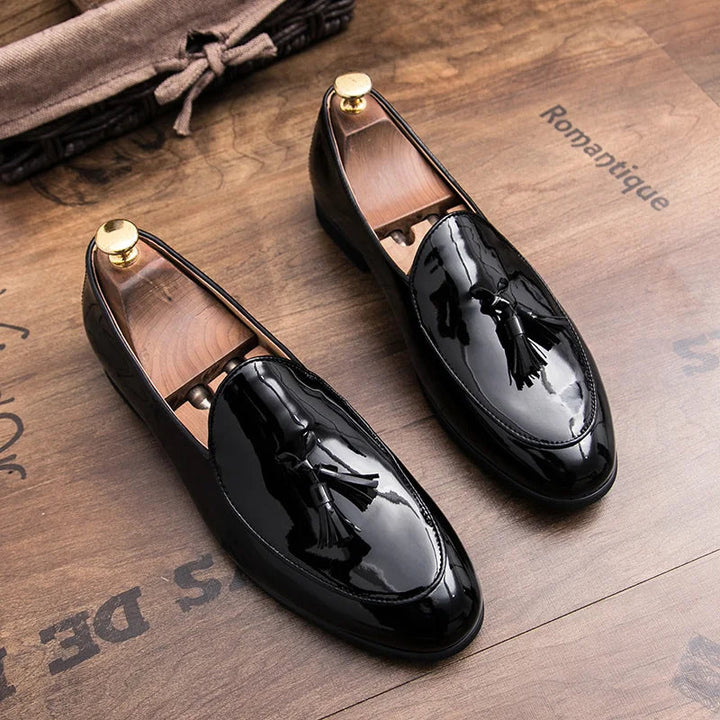 Men's comfortable dress loafers, polished black leather, perfect for formal events.