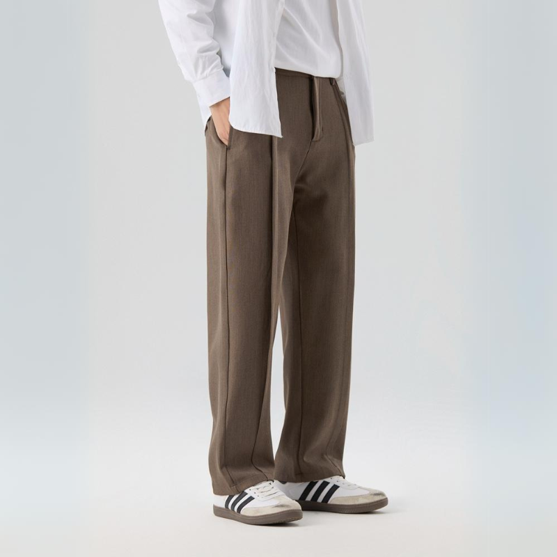 Men's Sterling pleated trousers for ultimate comfort & style. Relaxed fit, perfect for business casual.