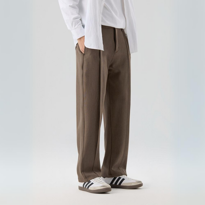 Men's Sterling pleated trousers for ultimate comfort & style. Relaxed fit, perfect for business casual.
