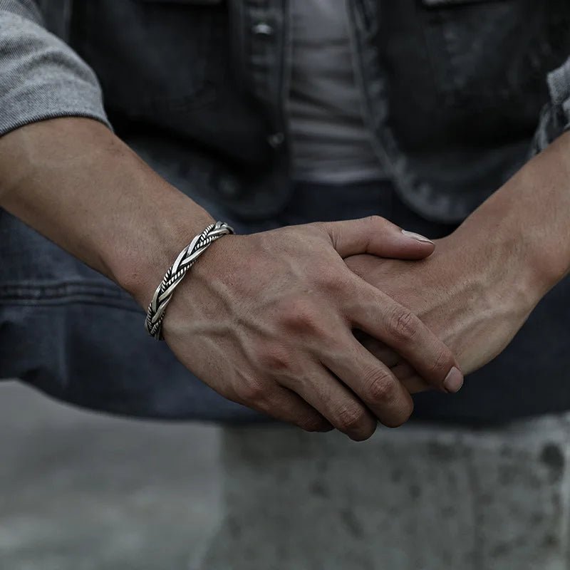 Oxidized sterling silver braided cuff bracelet for men, a versatile and adjustable men's accessory.
