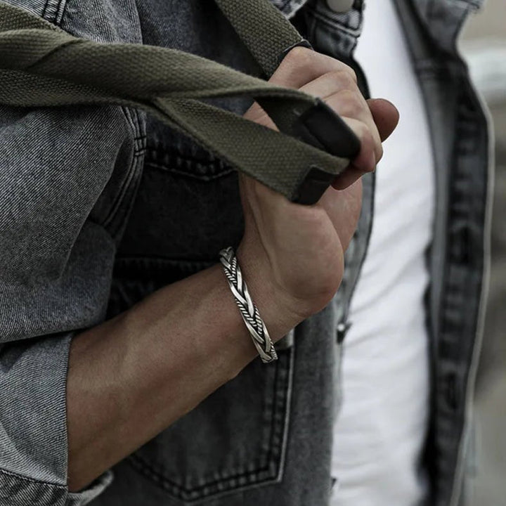 Stylish men's braided sterling silver open cuff bracelet, perfect for everyday wear and special occasions.