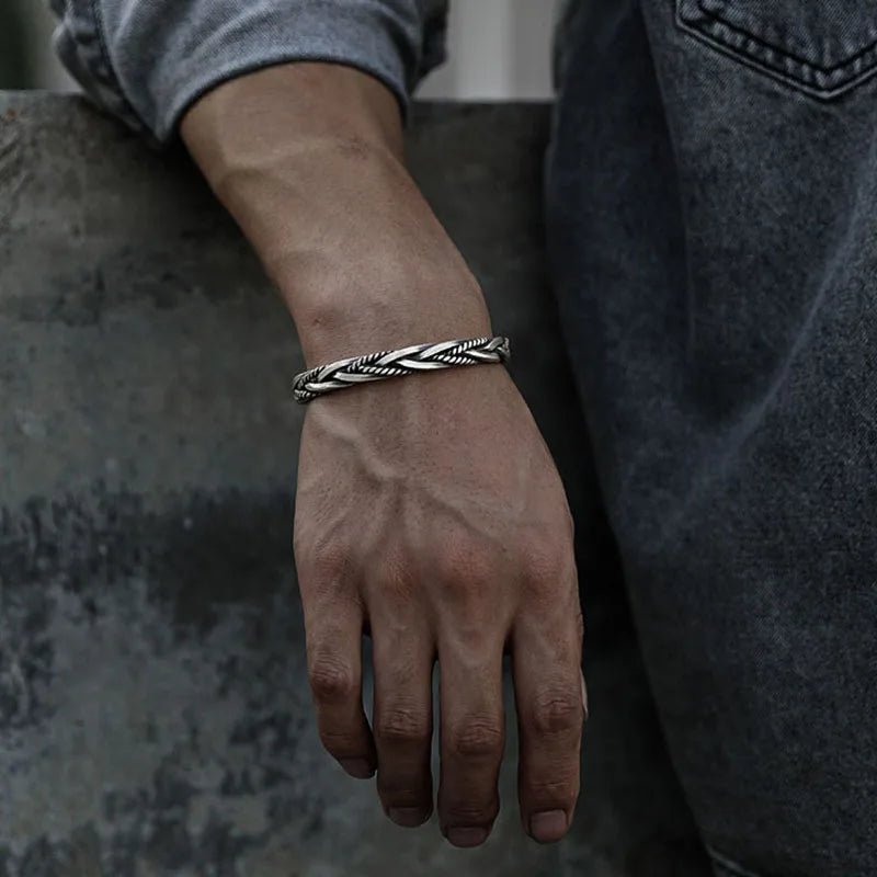 Adjustable men's sterling silver braided cuff bracelet, a comfortable and elegant piece of men's jewelry.