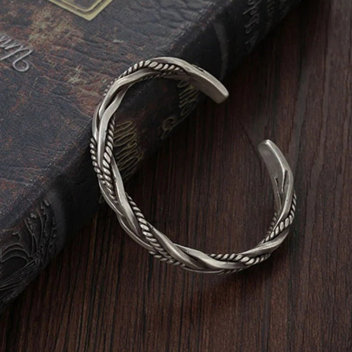 Rugged men's sterling silver braided cuff bracelet, a durable and fashionable open cuff accessory for men.