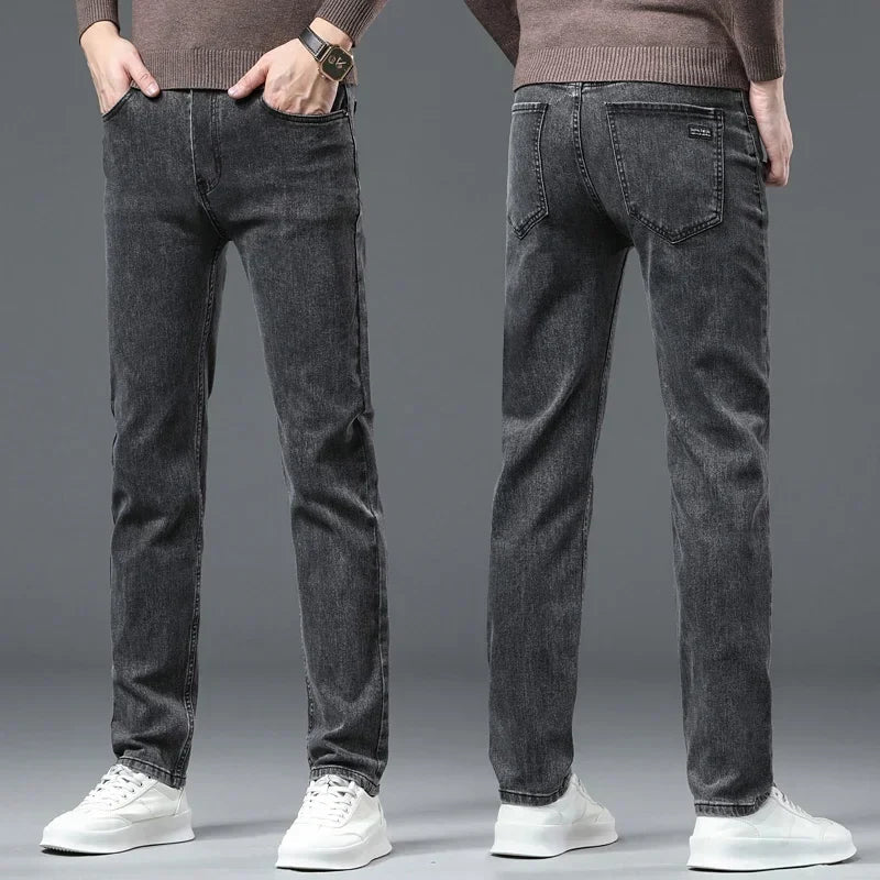 Stylish gray men's straight-leg stretch denim jeans, offering modern fit and all-day comfort.