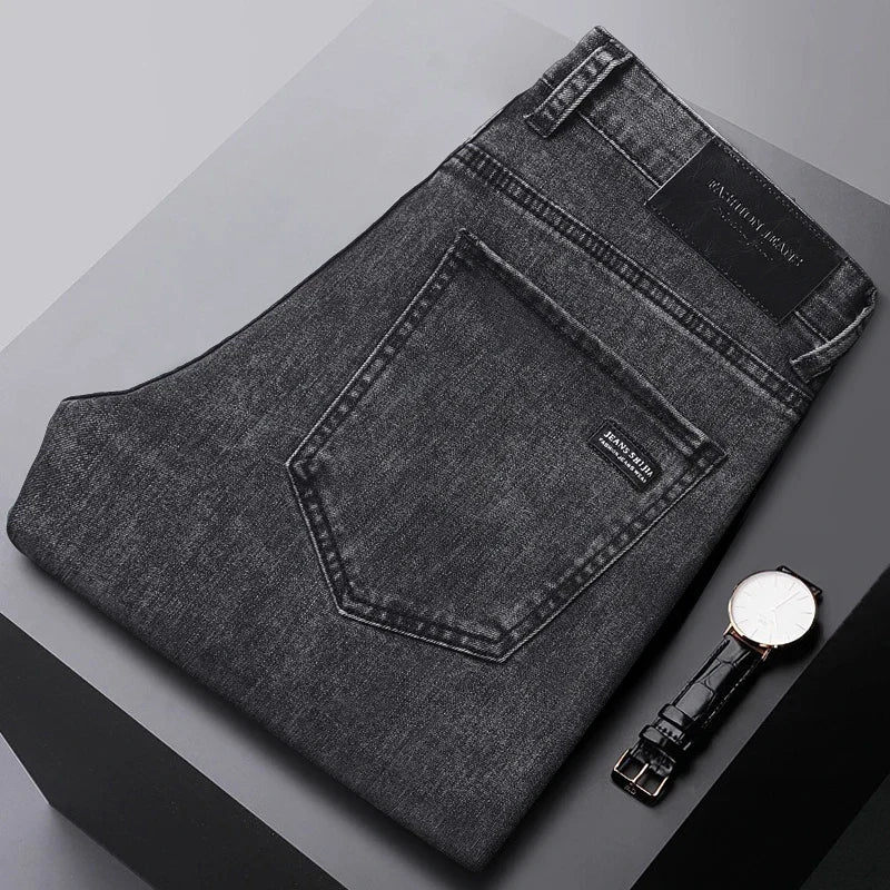 Modern fit men's straight-leg stretch jeans, high-quality denim for durability & flexibility.