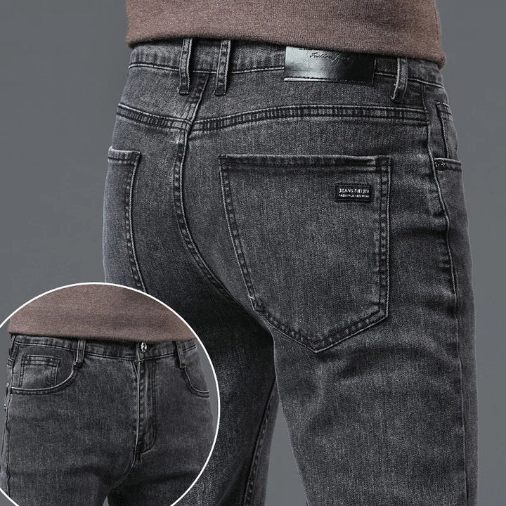 Comfortable men's straight-leg stretch denim jeans, great for casual outfits & everyday style.
