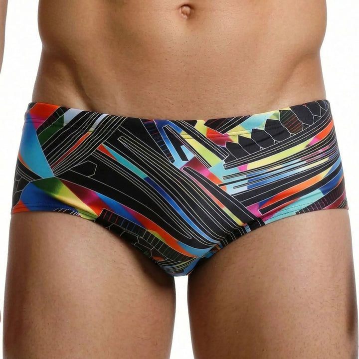Stylish low-rise men's square cut swim trunks. Modern swimwear design for athletic build & active summer.