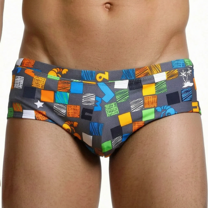 Resilient men's square cut swim trunks. Built for active swimming, beachwear & demanding water sports.
