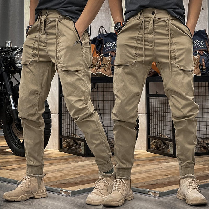 Durable men's stretch cargo utility pants, perfect for hiking, outdoor adventures & active travel. Comfortable fit.