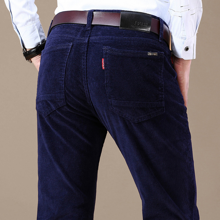 Man wearing comfortable men's stretch corduroy trousers, front view, showcasing casual everyday style and tailored fit.
