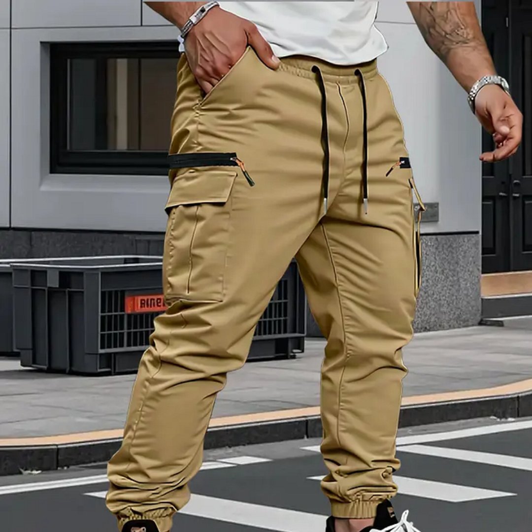 Stylish men's utility cargo joggers with stretch fabric & multiple pockets, ideal for activewear & travel.