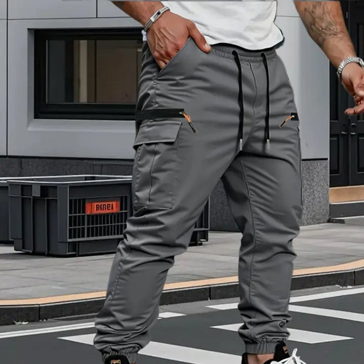 Modern men's stretch cargo joggers, versatile for casual outings, active lifestyles, and travel comfort.
