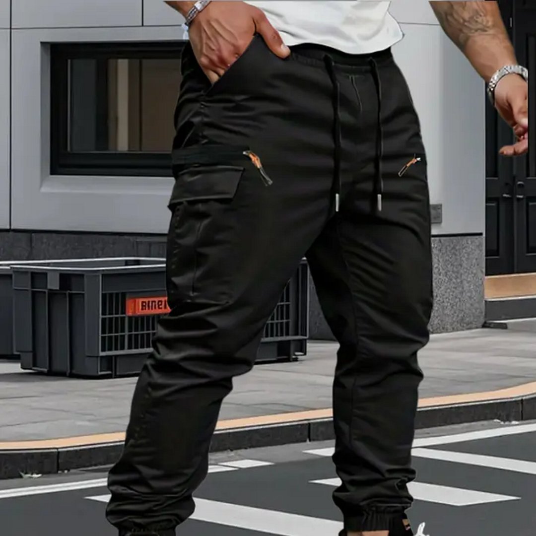 Comfortable men's stretch jogger cargo pants featuring a tapered leg, utility pockets & active fit.