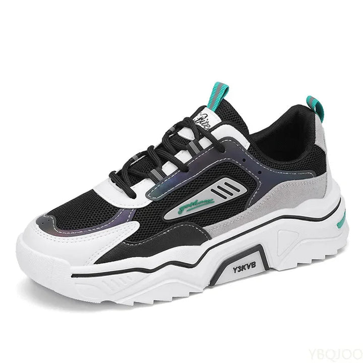 Trendy men's casual footwear: StrideFlex sporty sneakers in black/orange for active lifestyles.