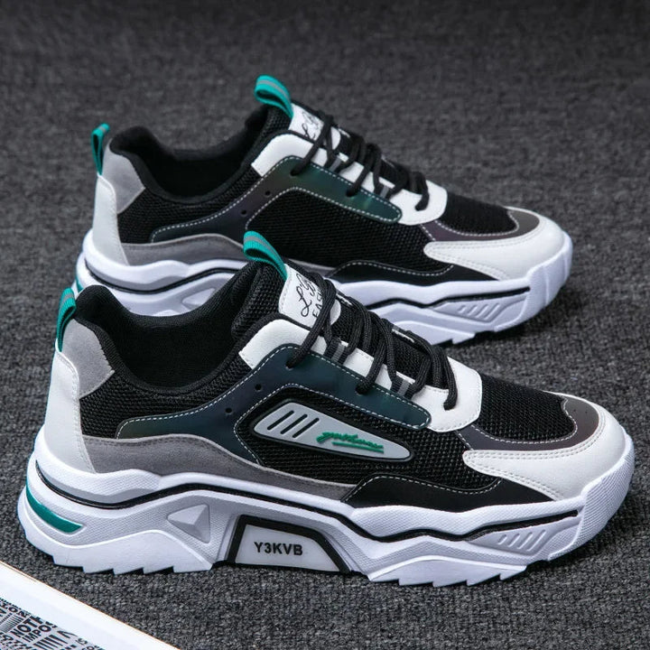 Versatile men's StrideFlex sneakers, black/orange, perfect for running, gym, or everyday wear.