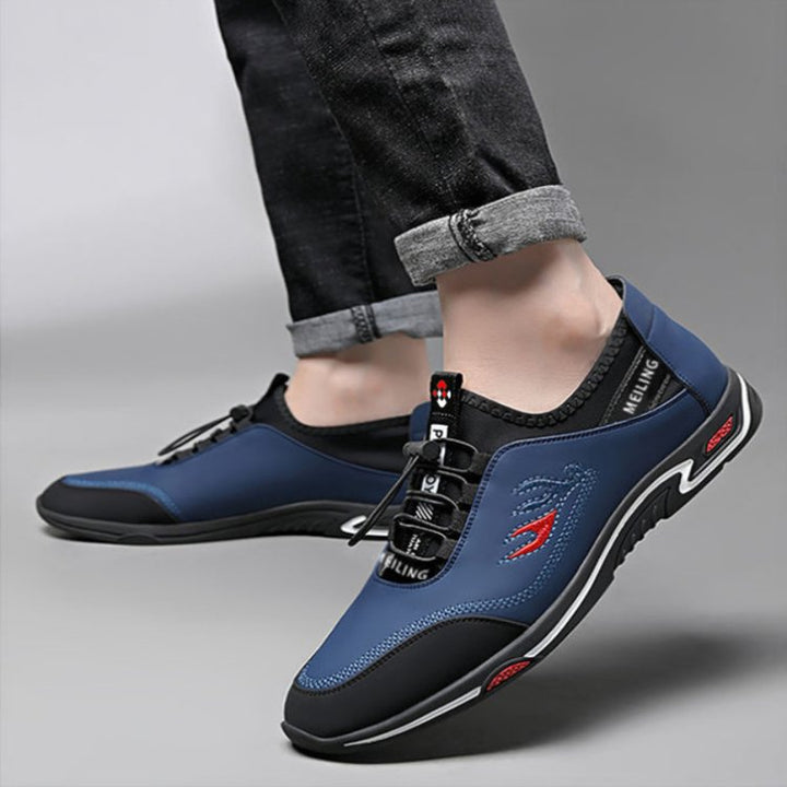 Black men's StrideLux athletic style sneakers, comfortable & versatile for everyday wear.
