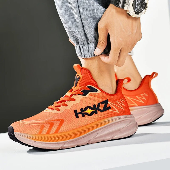 Detail of sole on Men's StrideX running shoes, durable grip for athletic performance
