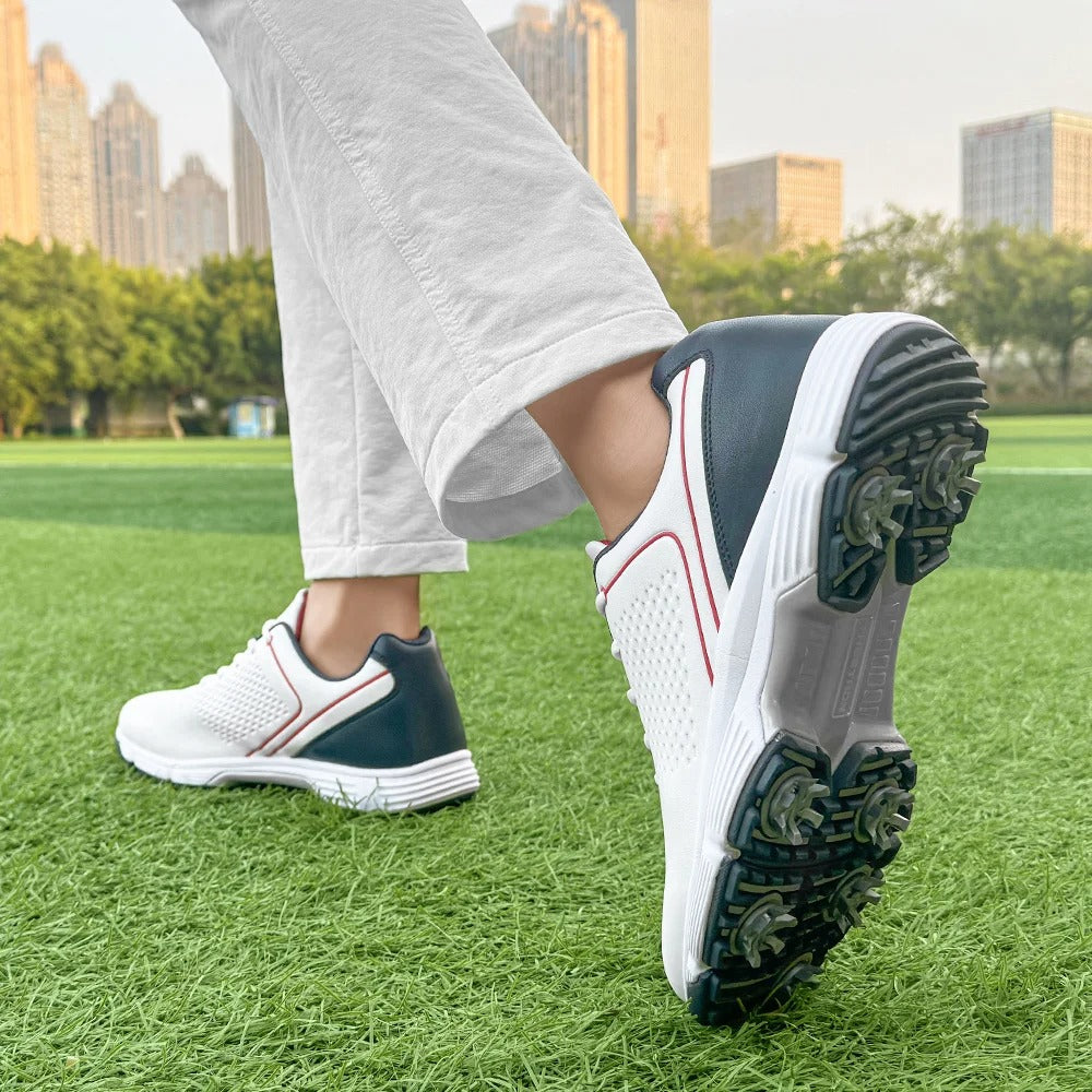 Ultimate Men's Striker Pro golf shoes, spiked for all-weather traction and comfort.
