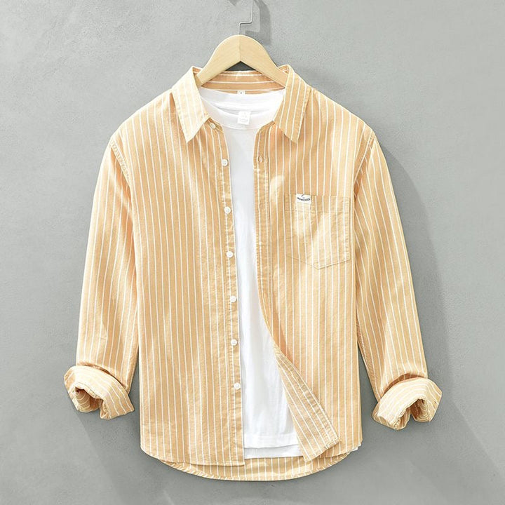 Men's striped casual shirt, modern fit, long sleeve button-up for stylish everyday wear.