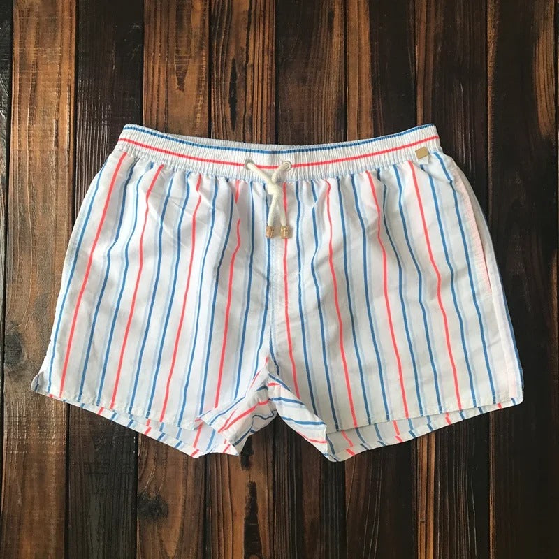 Breathable men's striped shorts, featuring an elastic waist, suitable for beach and leisure.