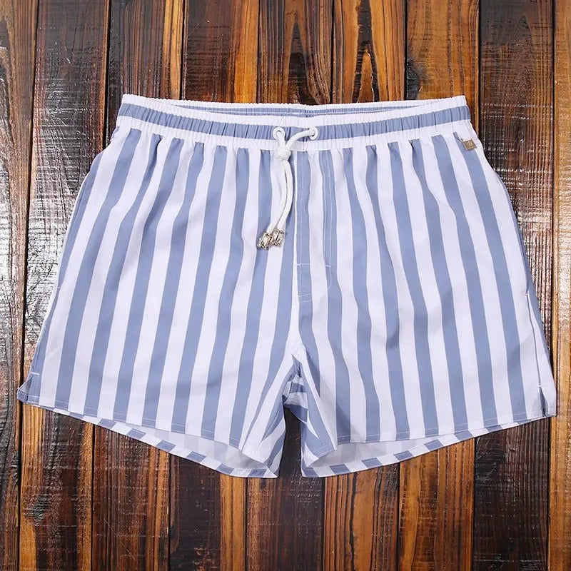 Men's shorts with classic stripes and elastic waist, perfect for warm weather fashion.