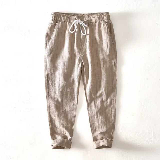 Effortless men's striped pants, super comfortable relaxed fit trousers with drawstring for leisure.
