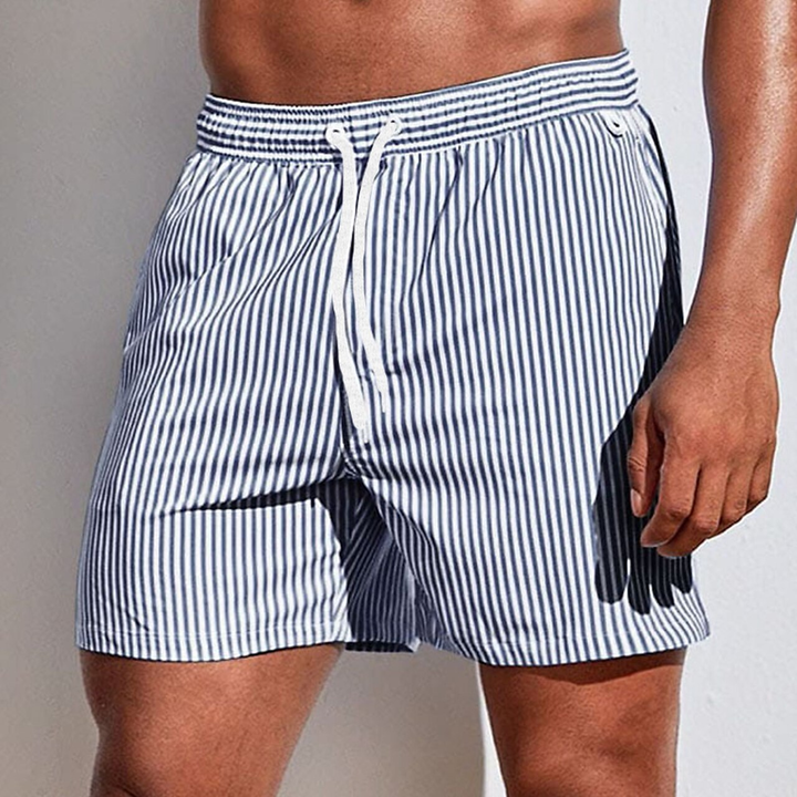 Vibrant striped men's quick-dry swim shorts, essential summer beach and pool wear for men.