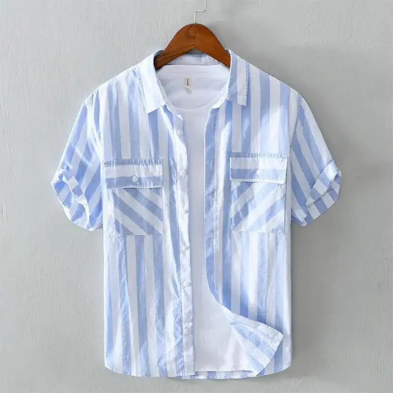 Men's casual striped button-up shirt with chest pockets, tailored for a modern look. Great for men's summer apparel.