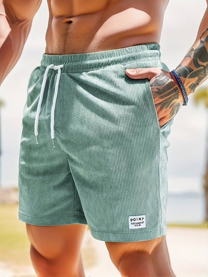 Casual men's striped shorts in a relaxed fit, suitable for beach days or summer events