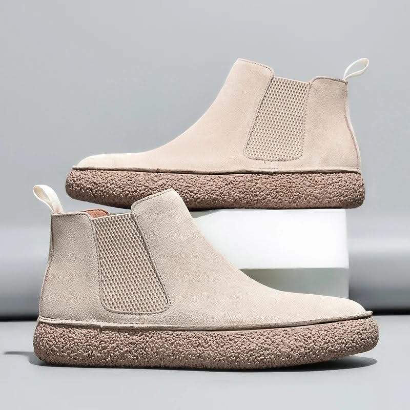 Men's stylish black leather Chelsea boots with orthopedic comfort for all-day wear.