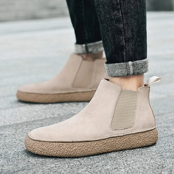 Modern men's brown Chelsea ankle boots, perfect for fall fashion & winter casual looks.