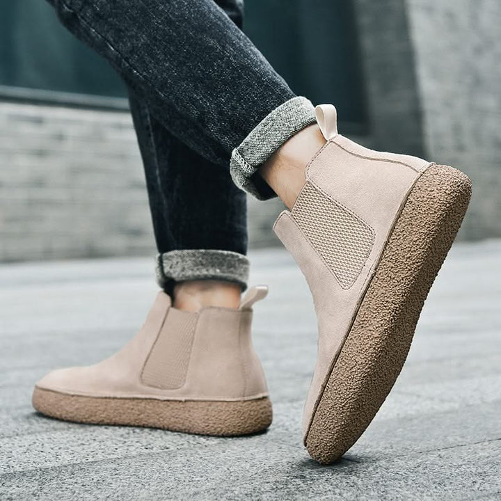 Versatile men's leather Chelsea boots, ideal as dress boots or comfortable casual footwear.