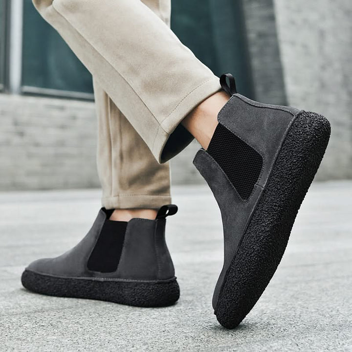Sharp men's black Chelsea boots for a polished, modern look with ergonomic support.