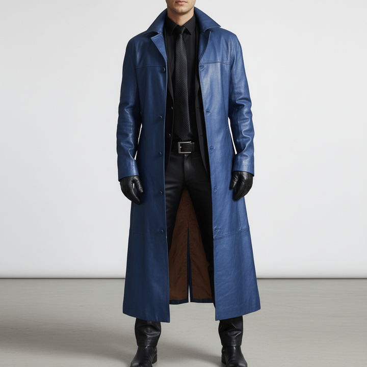 Handsome man wearing a black long leather jacket, showcasing stylish men's outerwear.