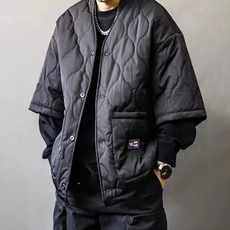 Men's stylish black quilted bomber jacket with utility pockets, perfect for casual outerwear & fall fashion.
